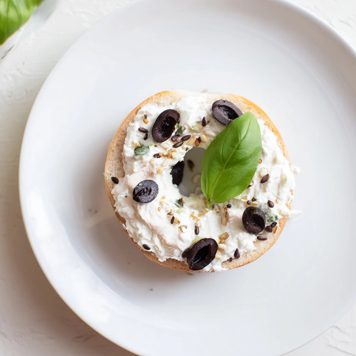Olympic Rings Medal Appetizer, bite-sized bagels arranged with colorful cream cheese for a festive snack.