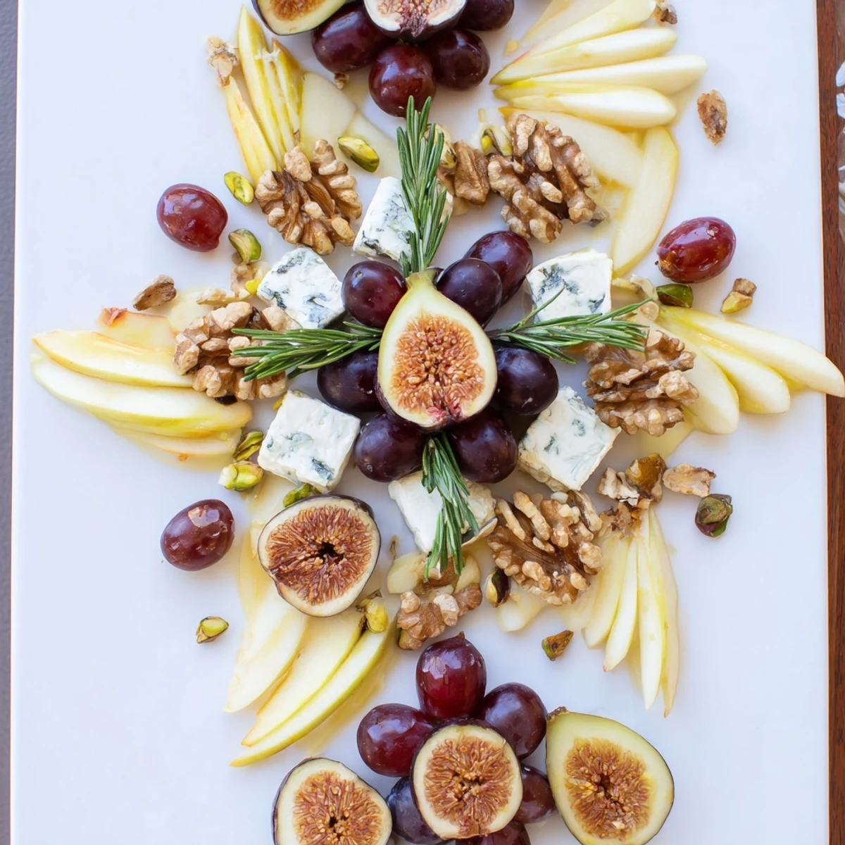 Beautiful Fig and Walnut Star Board arranged with fresh figs, walnuts, and vegan cheese waiting to be enjoyed.