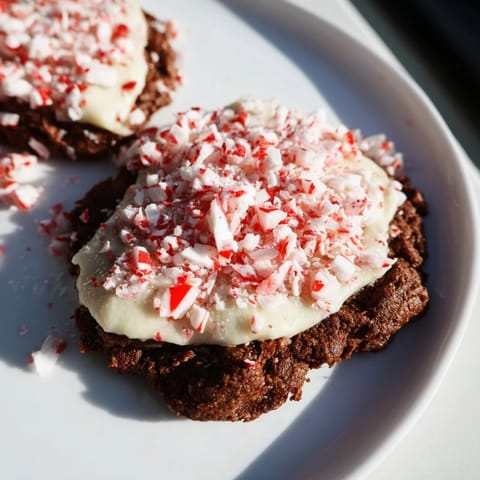 Delicious Peppermint Bark Cookies, a holiday treat: Buttery chocolate base topped with creamy white chocolate and peppermint.