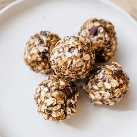 Delicious homemade Almond-Chia Energy Bites studded with chocolate chips, ideal for a quick energy boost.